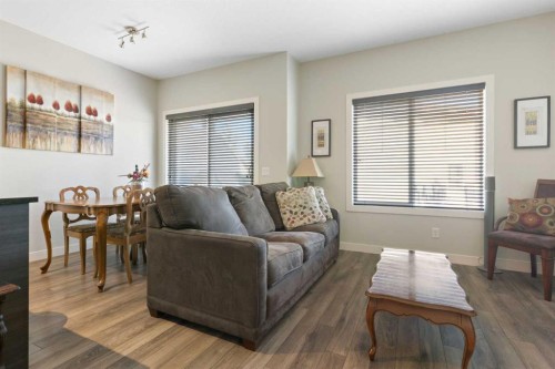 1403 Jumping Pound Common, Cochrane, AB - Indoor Photo Showing Living Room