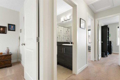 1403 Jumping Pound Common, Cochrane, AB - Indoor Photo Showing Other Room