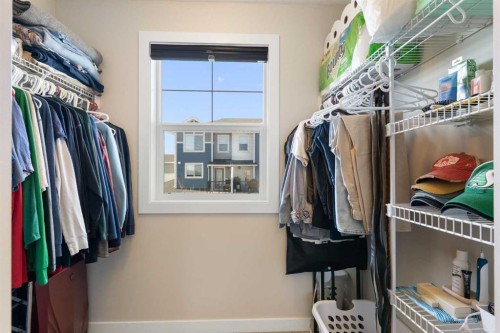 1403 Jumping Pound Common, Cochrane, AB - Indoor With Storage