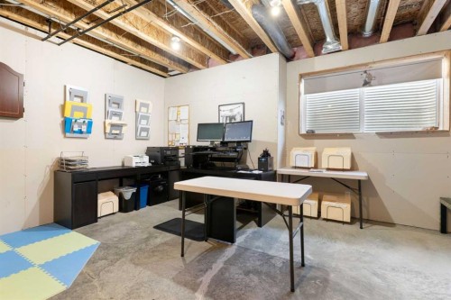 1403 Jumping Pound Common, Cochrane, AB - Indoor Photo Showing Other Room