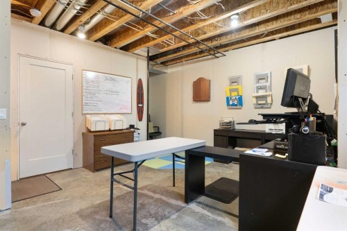 1403 Jumping Pound Common, Cochrane, AB - Indoor Photo Showing Basement