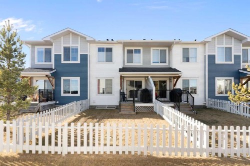 1403 Jumping Pound Common, Cochrane, AB - Outdoor With Facade