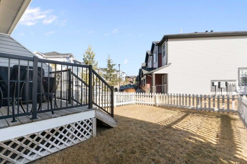 1403 Jumping Pound Common, Cochrane, AB - Outdoor With Deck Patio Veranda With Exterior