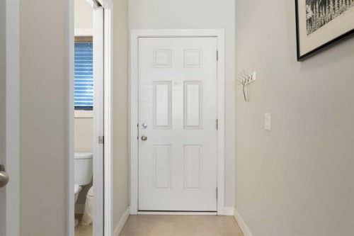 1403 Jumping Pound Common, Cochrane, AB - Indoor Photo Showing Other Room