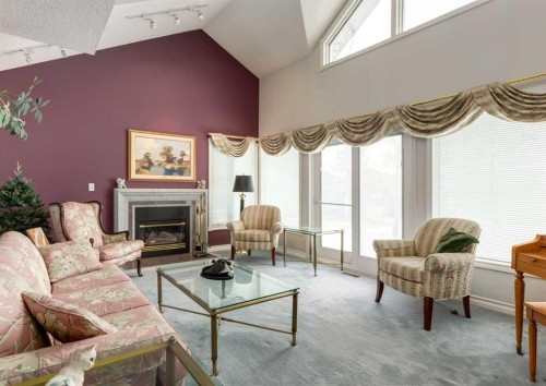 164 Hawksbrow Drive Nw, Calgary, AB - Indoor Photo Showing Living Room With Fireplace