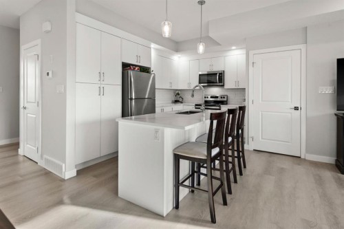 64-351 Monteith Drive Se, High River, AB - Indoor Photo Showing Kitchen With Upgraded Kitchen