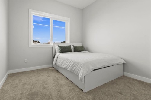 64-351 Monteith Drive Se, High River, AB - Indoor Photo Showing Bedroom