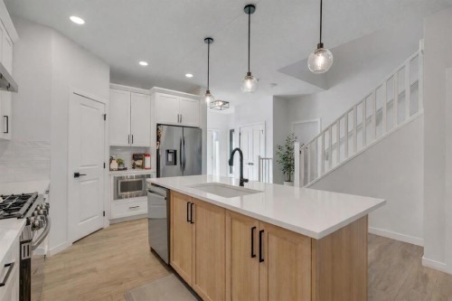 7582 202 Avenue Se, Calgary, AB - Indoor Photo Showing Kitchen With Upgraded Kitchen