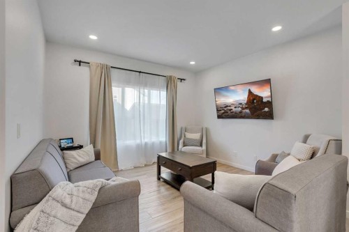 7582 202 Avenue Se, Calgary, AB - Indoor Photo Showing Living Room