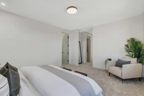 341 Limestone Bay, Balzac, AB - Indoor Photo Showing Bedroom