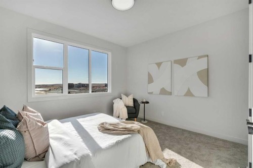 341 Limestone Bay, Balzac, AB - Indoor Photo Showing Bedroom
