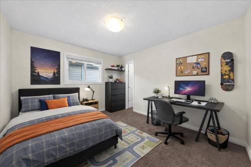 194 Sherwood Mount Nw, Calgary, AB - Indoor Photo Showing Bedroom