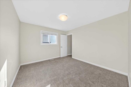 194 Sherwood Mount Nw, Calgary, AB - Indoor Photo Showing Other Room