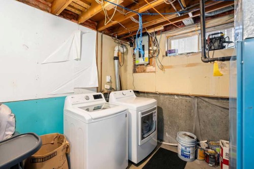 74 Castledale Way Ne, Calgary, AB - Indoor Photo Showing Laundry Room