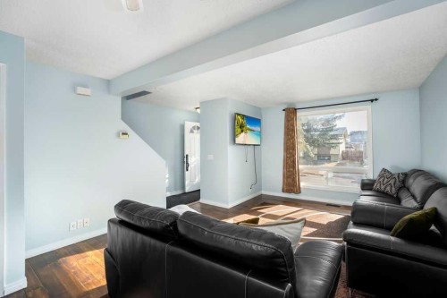 74 Castledale Way Ne, Calgary, AB - Indoor Photo Showing Living Room