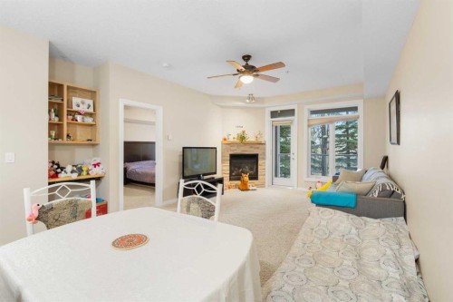8103-14 Hemlock Crescent Sw, Calgary, AB - Indoor With Fireplace