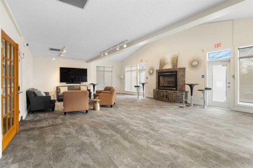 8103-14 Hemlock Crescent Sw, Calgary, AB - Indoor With Fireplace