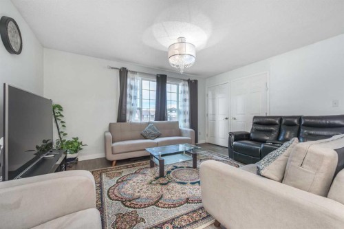 144 Rundleson Place Ne, Calgary, AB - Indoor Photo Showing Living Room