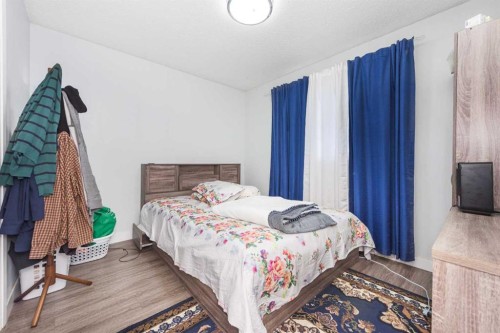 144 Rundleson Place Ne, Calgary, AB - Indoor Photo Showing Bedroom