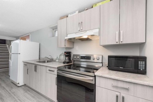 144 Rundleson Place Ne, Calgary, AB - Indoor Photo Showing Kitchen