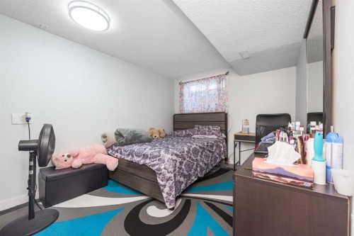 144 Rundleson Place Ne, Calgary, AB - Indoor Photo Showing Bedroom