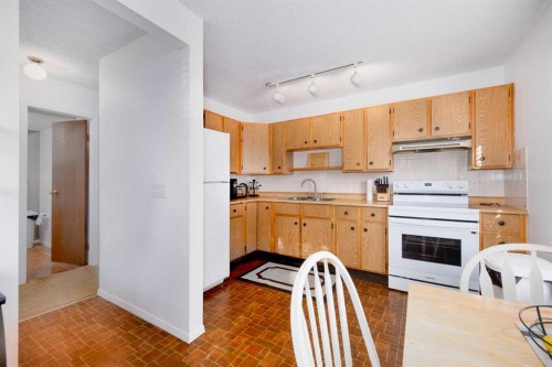 5-3200 60 Street, Calgary, AB - Indoor Photo Showing Kitchen With Double Sink