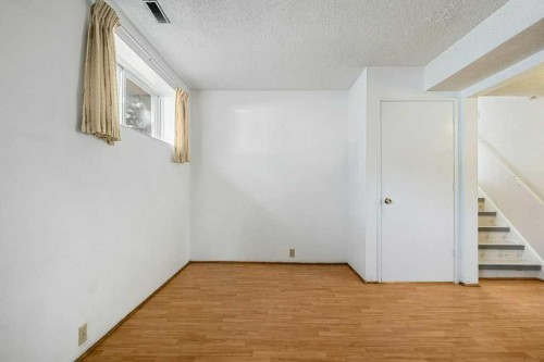 5813 Dalcastle Crescent Nw, Calgary, AB - Indoor Photo Showing Other Room