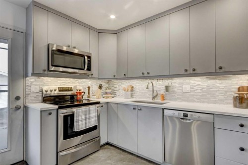 27 Rivercrest Circle Se, Calgary, AB - Indoor Photo Showing Kitchen With Stainless Steel Kitchen With Upgraded Kitchen