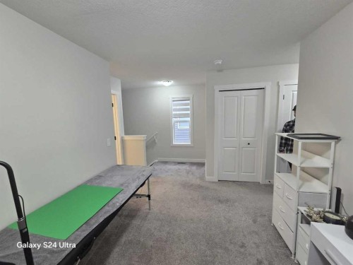 1509 Bayview Point Sw, Airdrie, AB - Indoor Photo Showing Other Room