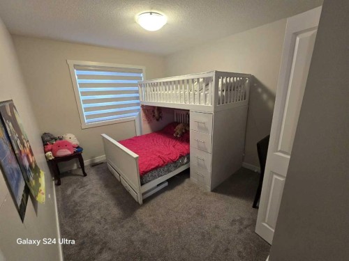 1509 Bayview Point Sw, Airdrie, AB - Indoor Photo Showing Bedroom