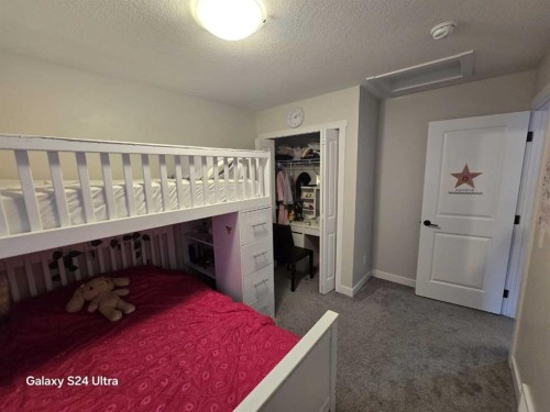 1509 Bayview Point Sw, Airdrie, AB - Indoor Photo Showing Bedroom
