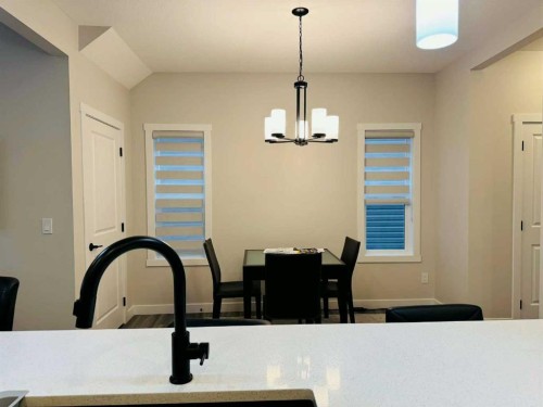 1509 Bayview Point Sw, Airdrie, AB - Indoor Photo Showing Dining Room