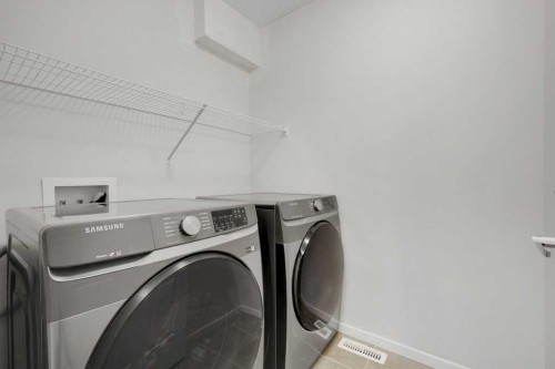 1465 148 Avenue Nw, Calgary, AB - Indoor Photo Showing Laundry Room