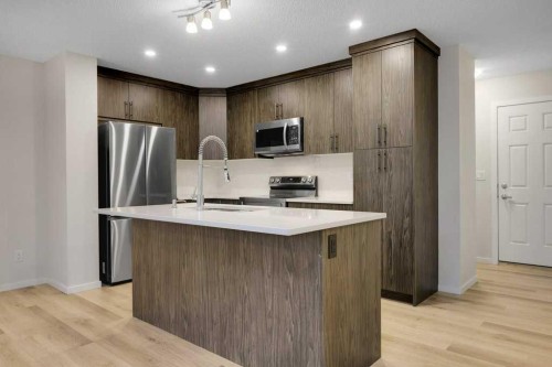 1465 148 Avenue Nw, Calgary, AB - Indoor Photo Showing Kitchen With Upgraded Kitchen