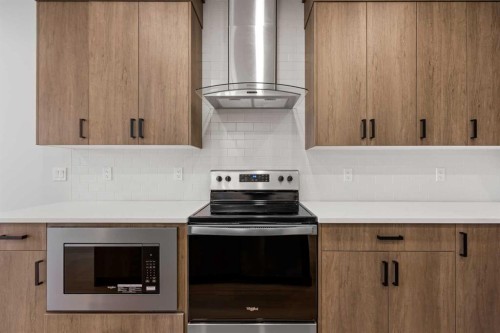 117 Bridgeport Gate, Chestermere, AB - Indoor Photo Showing Kitchen
