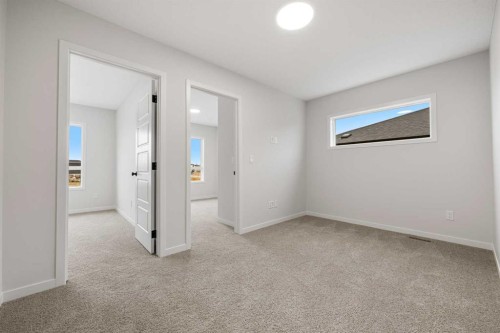 117 Bridgeport Gate, Chestermere, AB - Indoor Photo Showing Other Room