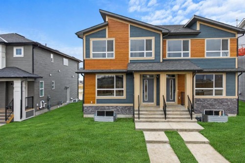 117 Bridgeport Gate, Chestermere, AB - Outdoor With Facade