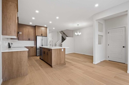 117 Bridgeport Gate, Chestermere, AB - Indoor Photo Showing Kitchen