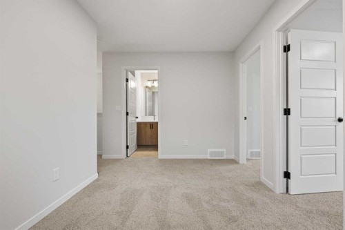117 Bridgeport Gate, Chestermere, AB - Indoor Photo Showing Other Room