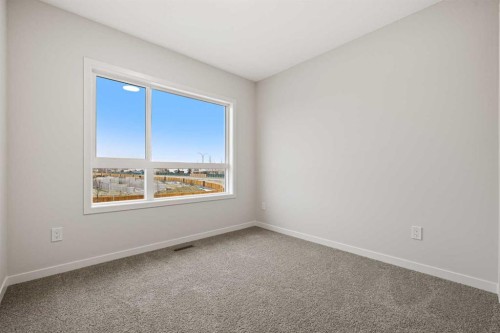 117 Bridgeport Gate, Chestermere, AB - Indoor Photo Showing Other Room