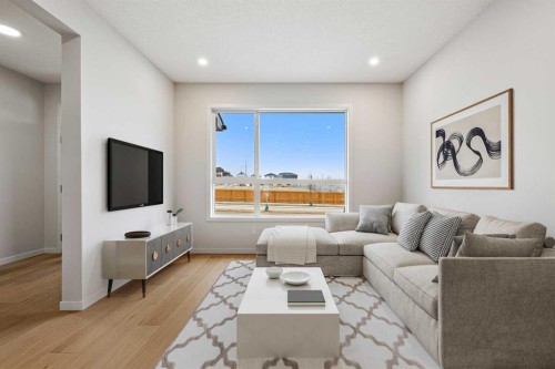 117 Bridgeport Gate, Chestermere, AB - Indoor Photo Showing Living Room