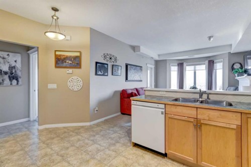 413-15 Everstone Drive Sw, Calgary, AB - Indoor Photo Showing Kitchen With Double Sink