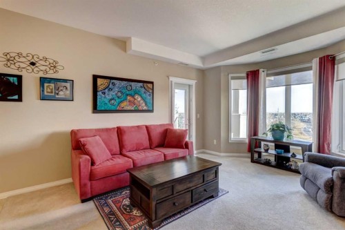 413-15 Everstone Drive Sw, Calgary, AB - Indoor Photo Showing Living Room