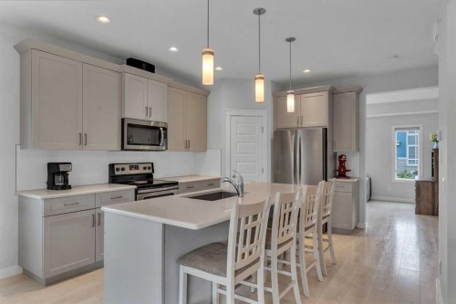 7 Corner Meadows Common Ne, Calgary, AB - Indoor Photo Showing Kitchen With Stainless Steel Kitchen With Upgraded Kitchen
