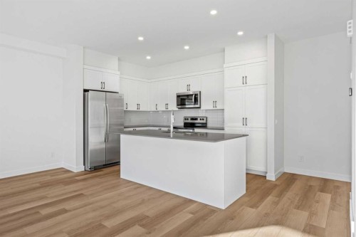 8531 21 Avenue Se, Calgary, AB - Indoor Photo Showing Kitchen With Stainless Steel Kitchen With Upgraded Kitchen