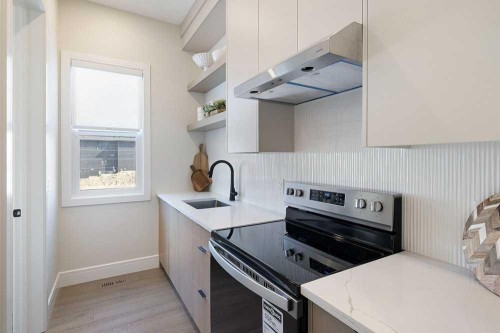 301 Limestone Bay, Balzac, AB - Indoor Photo Showing Kitchen With Upgraded Kitchen