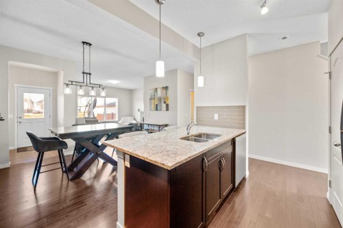 112 Copperpond Park, Calgary, AB - Indoor Photo Showing Kitchen With Double Sink