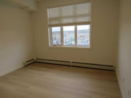 403-70 Sage Hill Walk Nw, Calgary, AB - Indoor Photo Showing Other Room