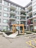 2413-111 Wolf Creek Drive Se, Calgary, AB  - Outdoor With Balcony With Facade 