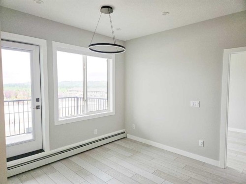 2413-111 Wolf Creek Drive Se, Calgary, AB - Indoor Photo Showing Other Room